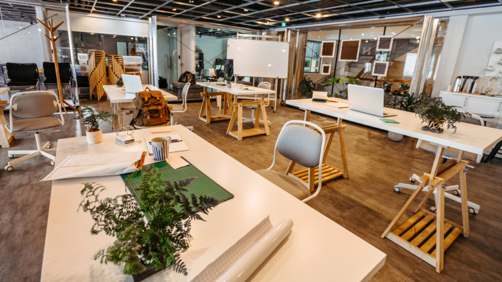 room with tables and greenery
